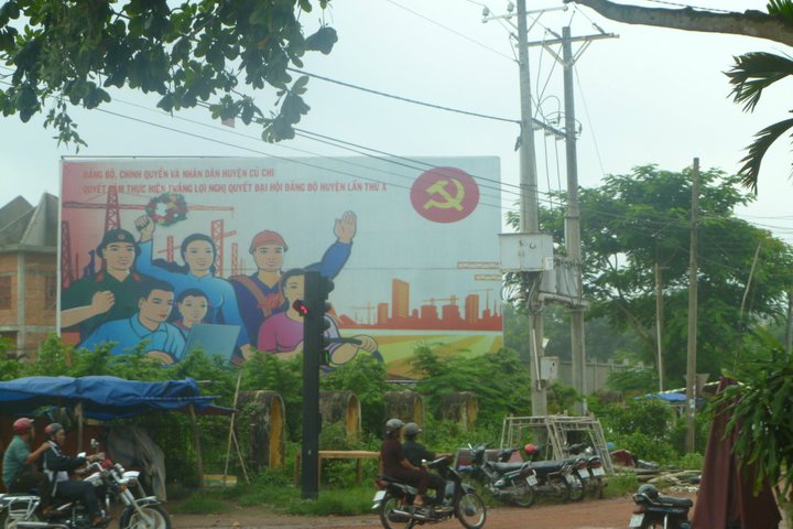 Vietnamese communist mural, utilising many symbols iconic to socialist countries.