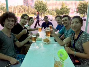 Tourists relax with a beer at Kwangbok Department Store