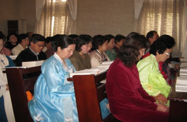 North Korean praying in Church