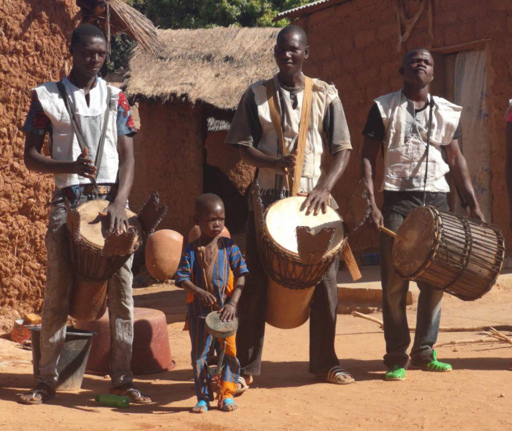 Drummers part of a pottery dance in Kawara, Burkina Faso