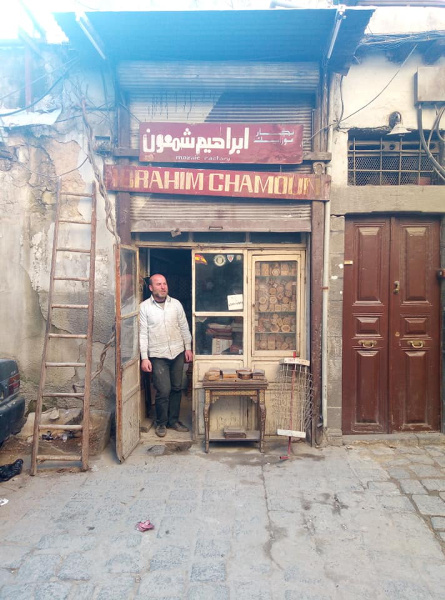 A shopowner in Damascus