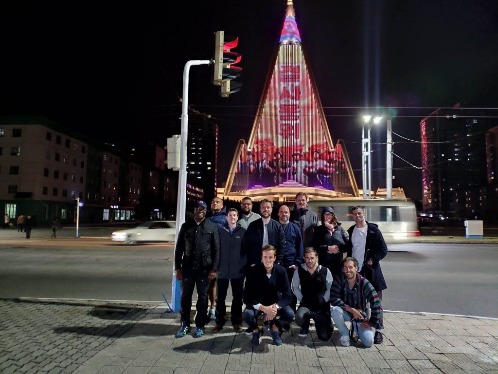 YPT stands in front of the Ryugyong hotel in Pyongyang