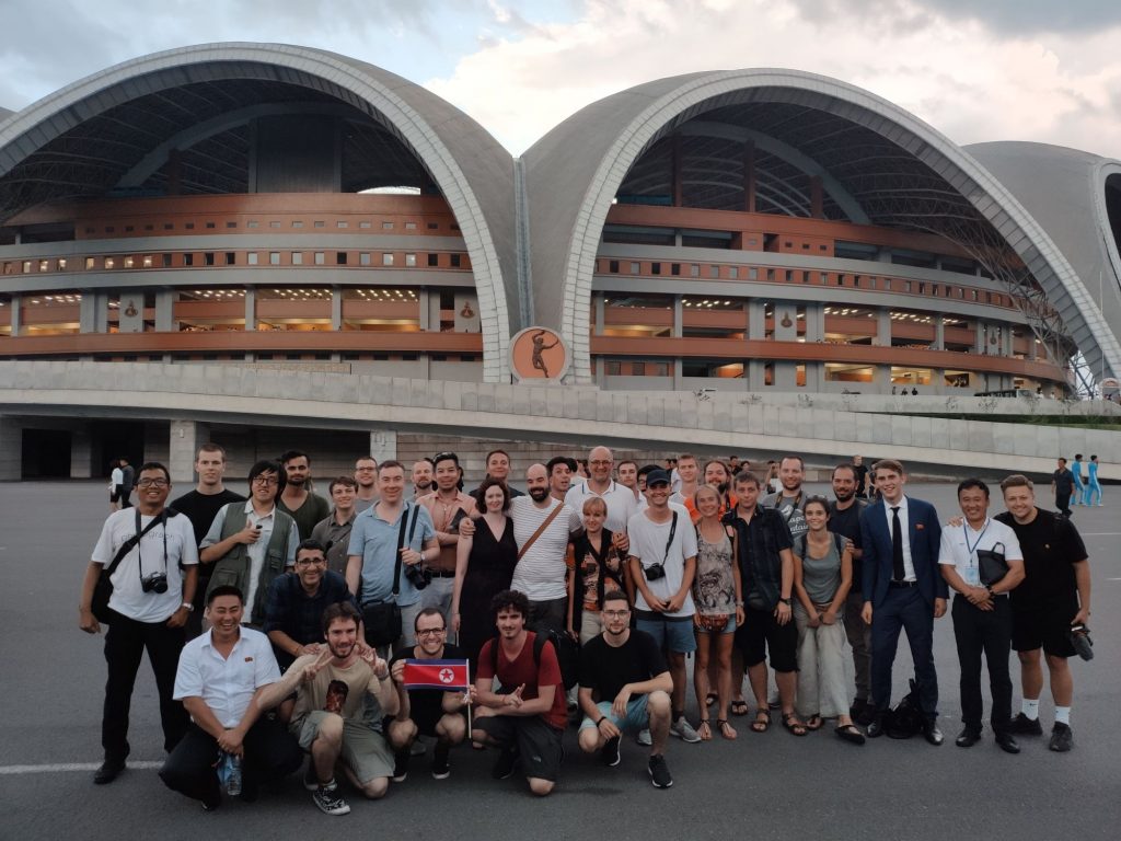 Our group standing in front of the Rungrado May Day Stadium