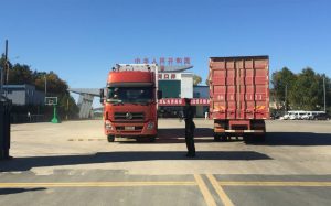 Trucks cross the Hunchun border crossing.  -- China-North Korea border
