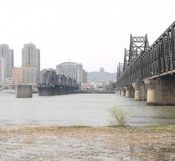 The North Korean border city of Sinuiju, as seen across the river from Dandong.