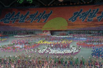 Mass Games tours: performers dance at the May Day stadium.