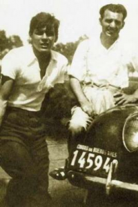 Che Guevara and Alberto Granado pose with their motorcycle. 