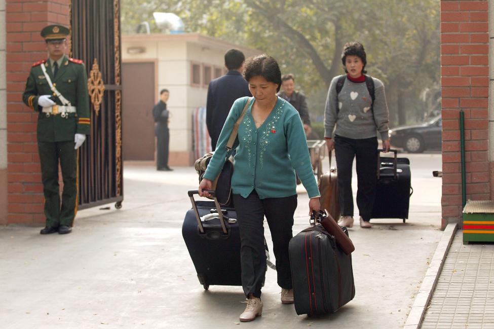 Can North Koreans leave? Two North Korean women leave the DPRK embassy in Beijing.