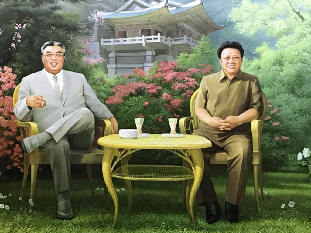 Kim Il-Sung and Kim Jong-Il. Key to answering what is Juche.