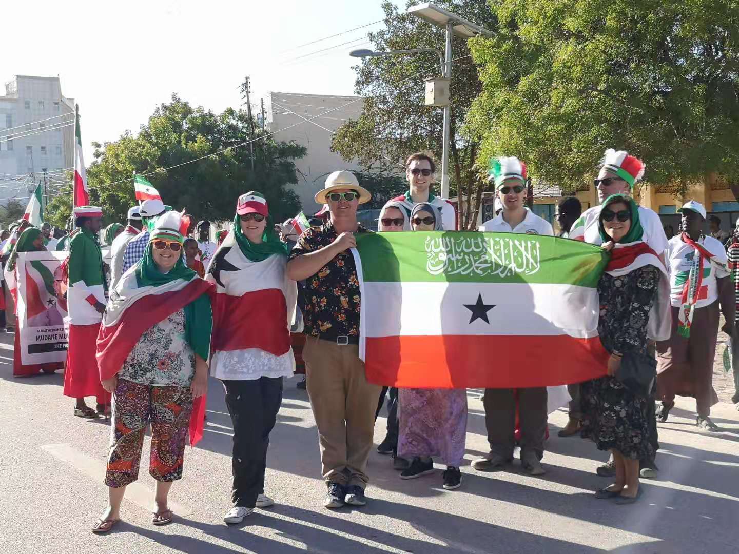 YPT holding the flag of Somaliland during the military parade