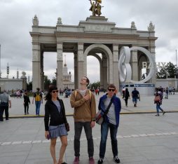 Pioneers pose in front of the entrance to Moscow's VDNKh.