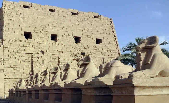 An array of stone rams guard the Karnak Temple. 