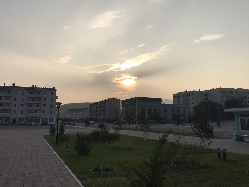 The sun sets over Rason, North Korea.