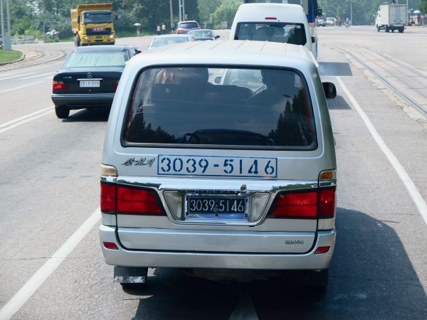 A black license plate in North Korea means a car owned by the military