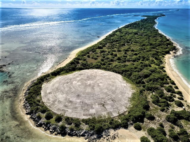 Worst islands: an overhead shot of the protective concrete dome placed over a heavily irradiated area of Enewetak Atoll, Marshall Islands. 