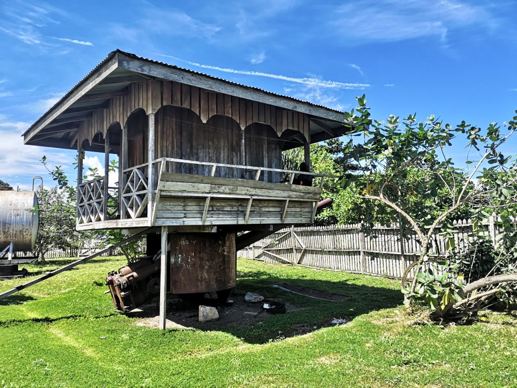 A local uses a Japanese gun in Kunde Beach, bougainville as the foundation of his house