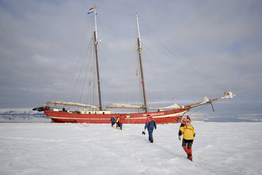 Overland tours: more of an overseas tour, as adventurers board their ship in the Arctic Ocean.