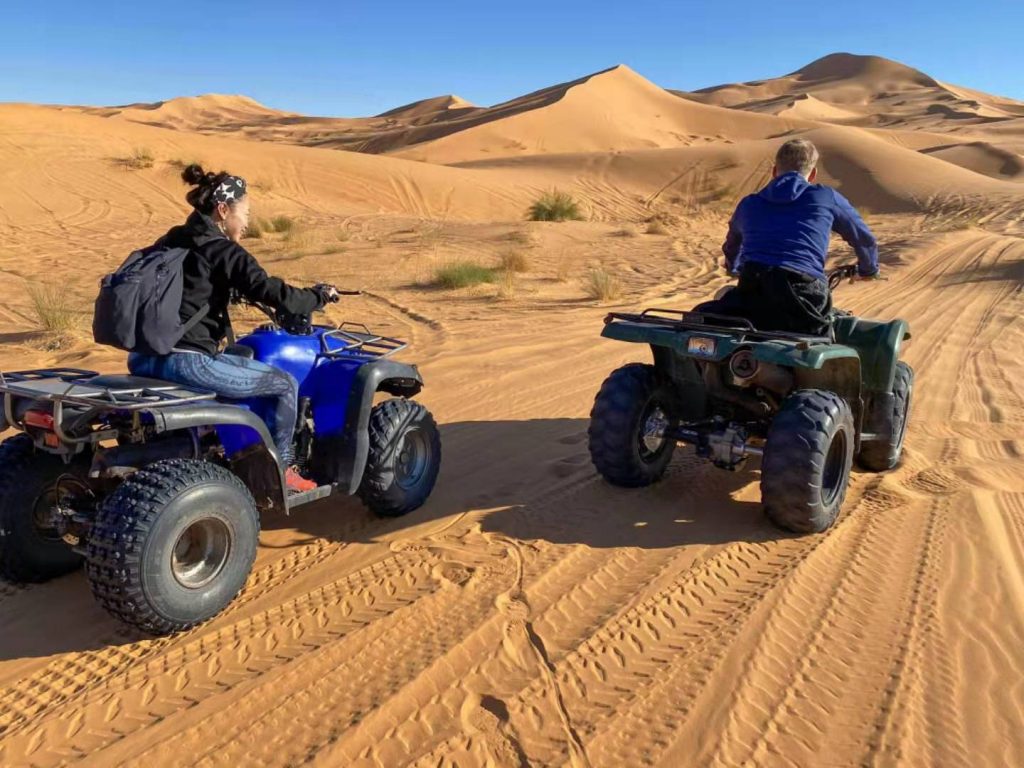 Riding quads in Taghit, Algeria