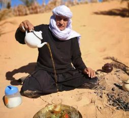 A nomad serves tea in the Algerian Desert near Taghit