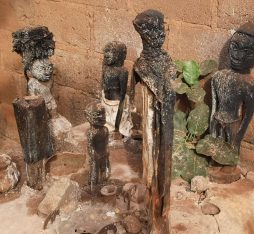 Different statues of voodoo gods