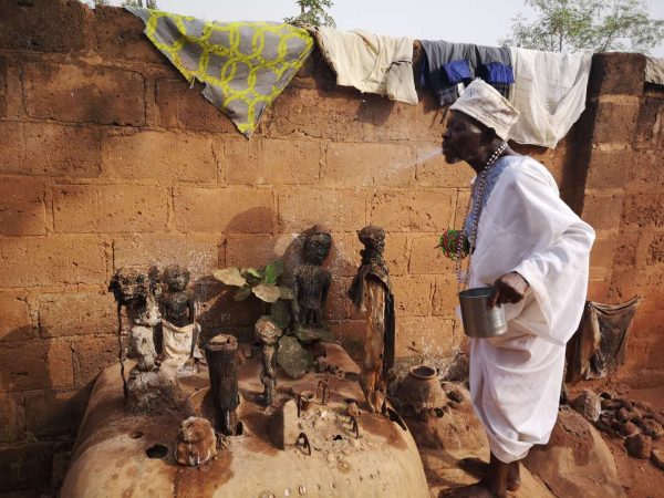 The voodoo priest of Abomey conduct a ceremony