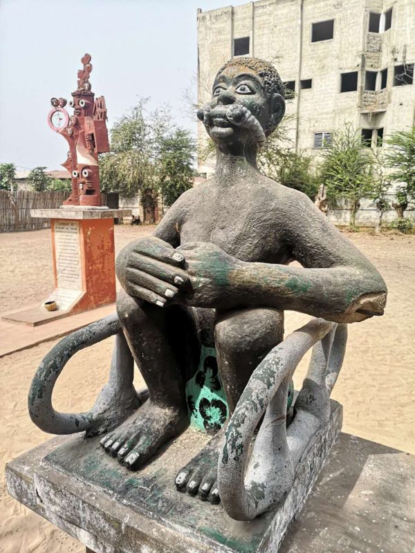 The statue of a gagged slave on the slave trail of Ouidah