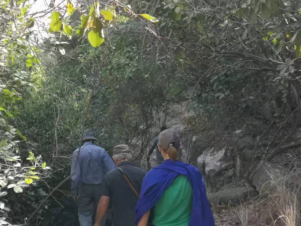 Walking to the animist site of Dafra in Burkina Faso