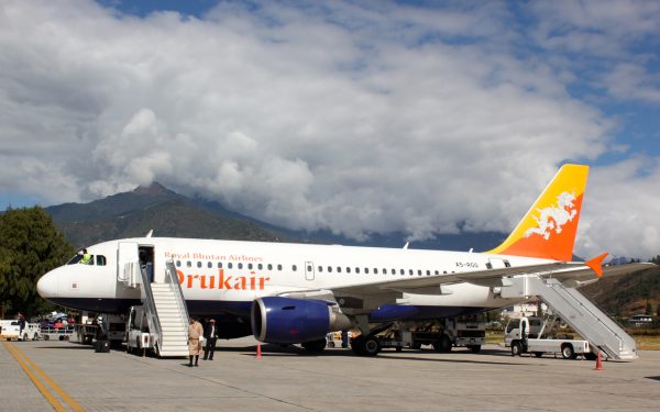 Druk Air lands in Paro Airport to get to Bhutan