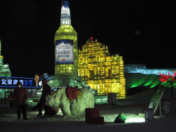 A sculpture in the shape of a Harbin Beer bottle at the Harbin Snow and Ice Festival