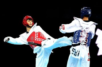Two fighters practicing Taekwondo