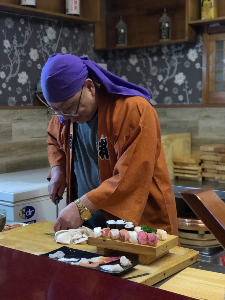 Kenji Fujimoto preparing sushi in Pyongyang