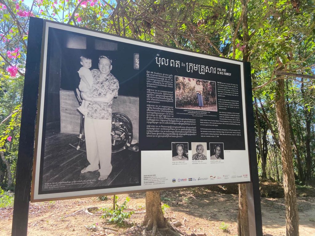 A sign with the history of the despot Pol Pot and his daughter