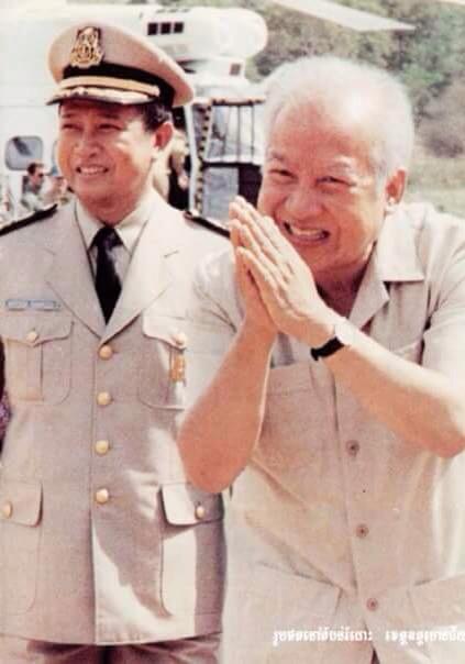 Norodom Sihanouk and his son inspecting forces