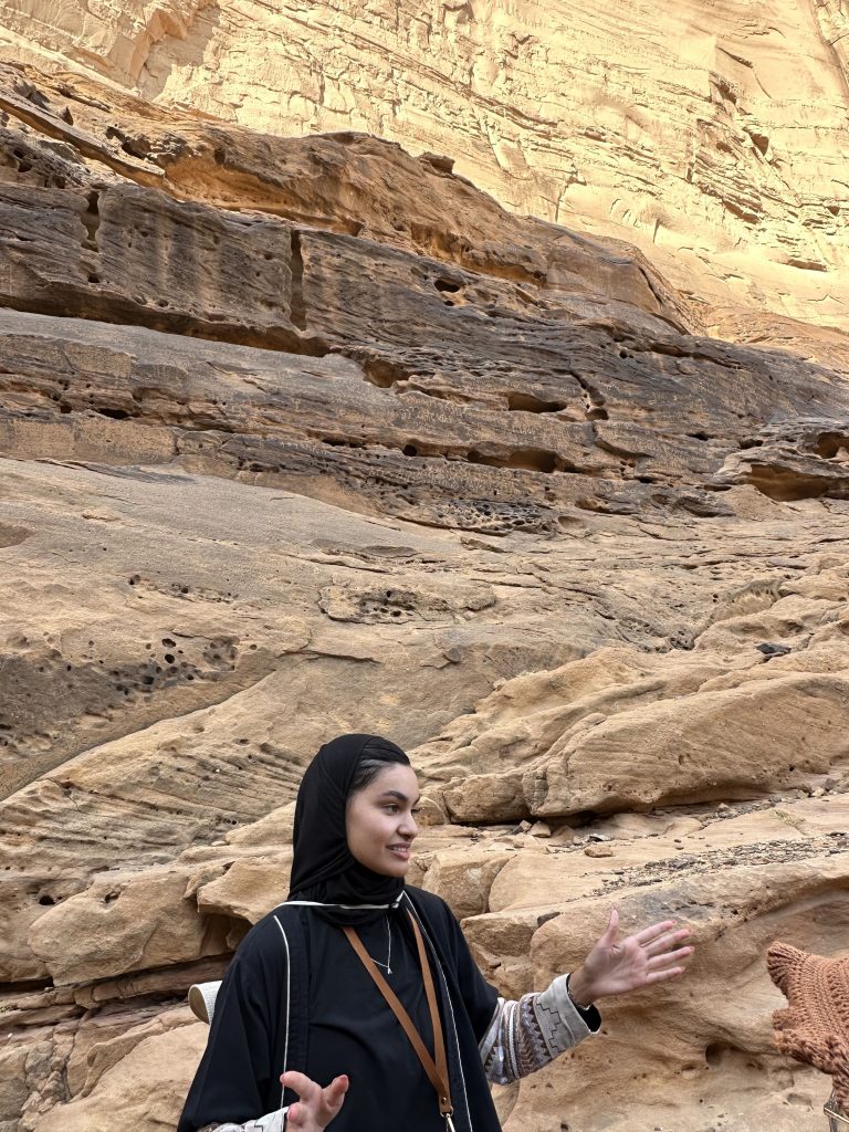 Female tour guide at Ikmah mountain, saudi arabia