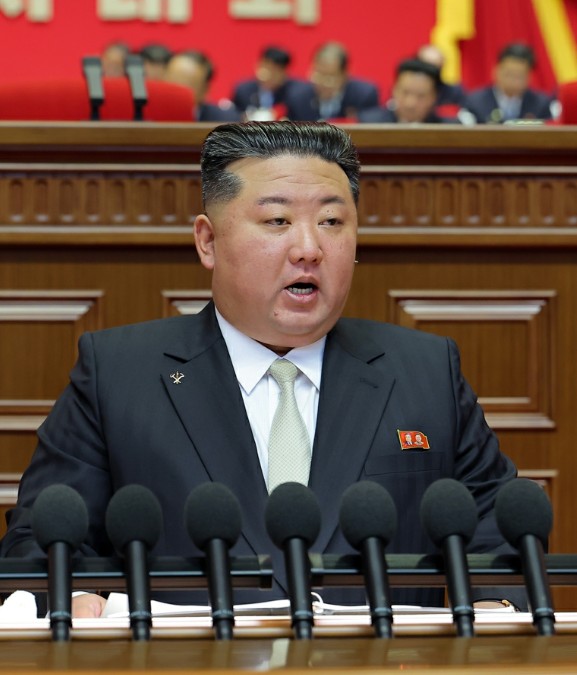 Kim Jong Un Wears the Badge of Kim Il Sung and Kim Jong Il Again